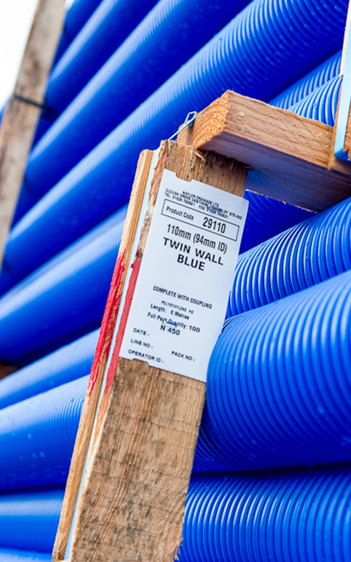 Industrial Tags on Wood Industrial tags on wood next to plastic tubing